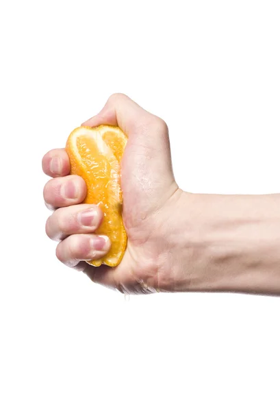 Squeezing an orange — Stock Photo, Image