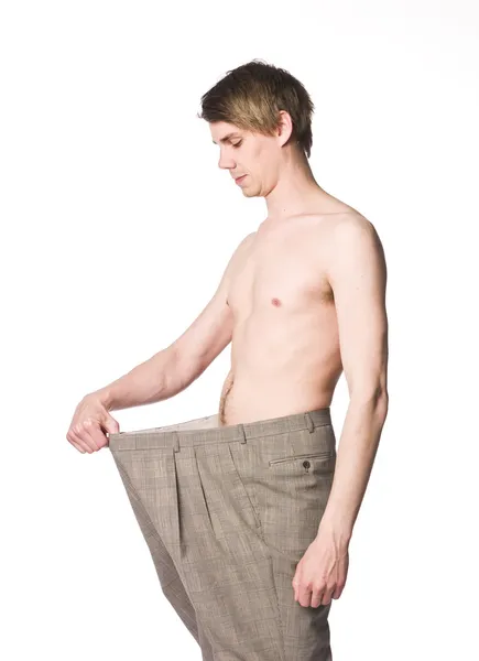 Uomo con i pantaloni grandi — Foto Stock