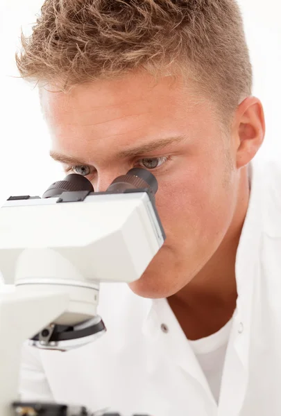 Researcher with microscope — Stock Photo, Image