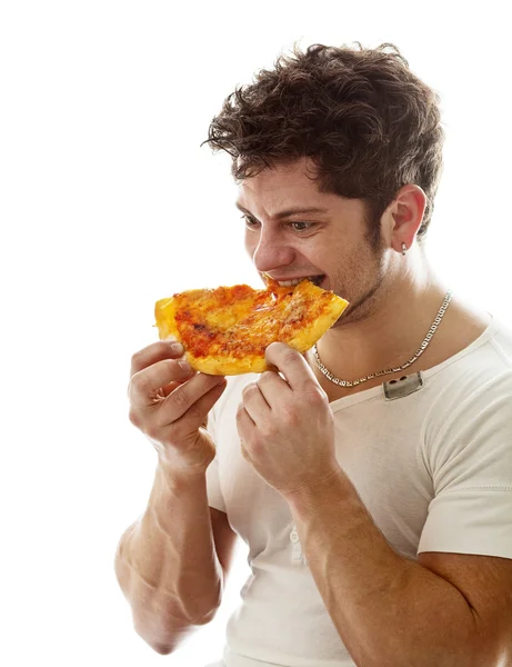 Young man enjoying pizza — Stock Photo, Image