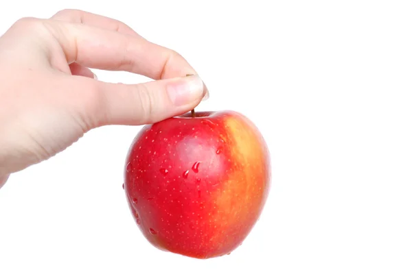 Heldere rode appel in vrouwen hand — Stockfoto
