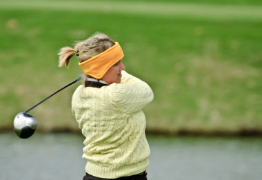 Female college golfer clipart