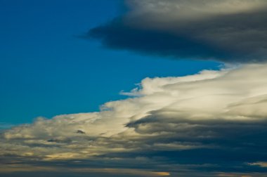 Stratus cloud formation with blue sky clipart