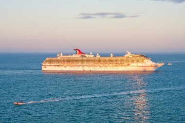 Cruise Ship at Dawn with Coast Guard clipart