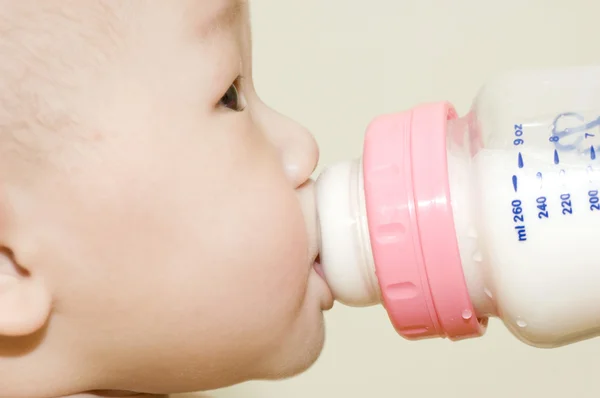 Drinking bottle milk — Stock Photo, Image