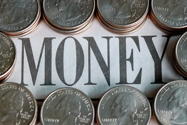 Cuartos de EE.UU. que rodean la palabra dinero —  Fotos de Stock