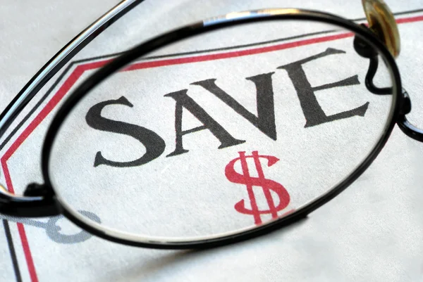 Concéntrate en ahorrar dinero —  Fotos de Stock