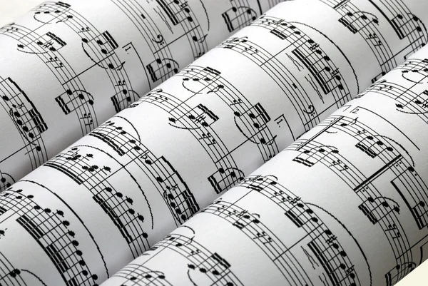 Three music sheets on a row — Stock Photo, Image