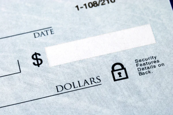 Write the dollar amount on the check — Stock Photo, Image