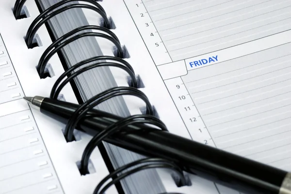 Escreva algumas notas sobre o planejador do dia — Fotografia de Stock