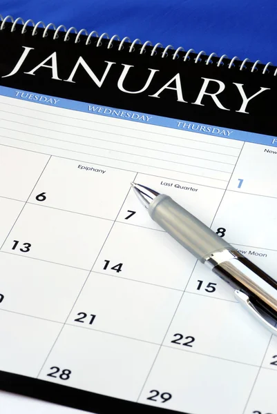 Планувати новий рік з календарем — стокове фото