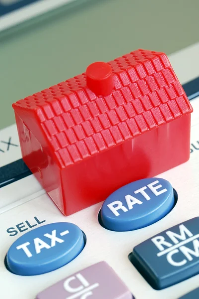 Расчет ставки ипотечного кредита и налога — стоковое фото