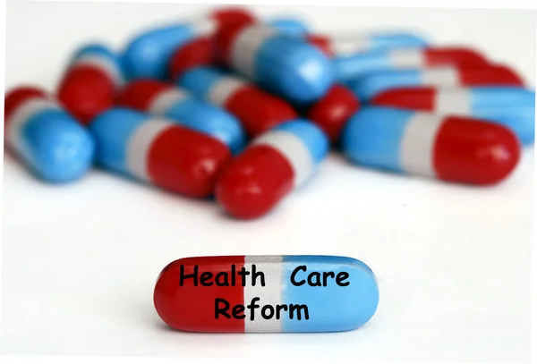Pillen zur Gesundheitsreform lizenzfreie Stockbilder