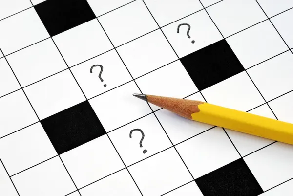 Crossword puzzle with question marks — Stock Photo, Image