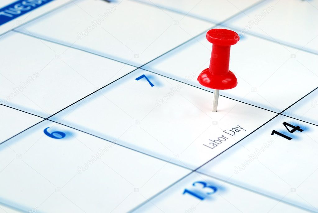 A red pin nailed in the calendar