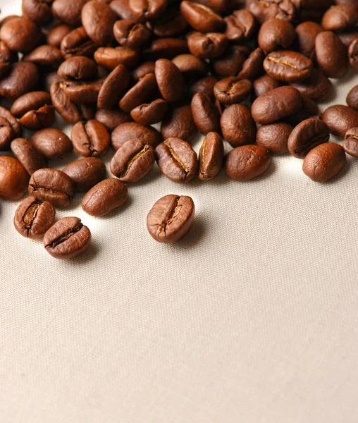 Coffee grains on a rough sacking — Stock Photo, Image