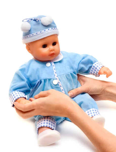 Детская кукла в синем костюме — стоковое фото
