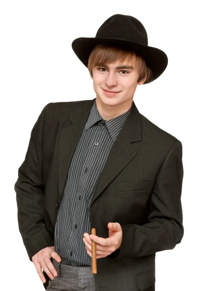 Young man with cigar in hat — Stock Photo, Image
