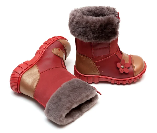 Červené dětské boty s kožešinou — Stock fotografie