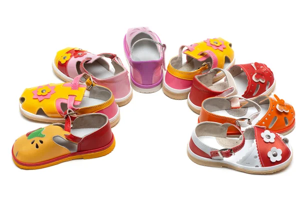 Sandálias de bebê expostas por semicírculo — Fotografia de Stock