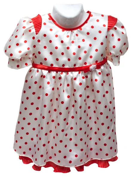 Vestido de bebê no hatrack com padrão vermelho — Fotografia de Stock