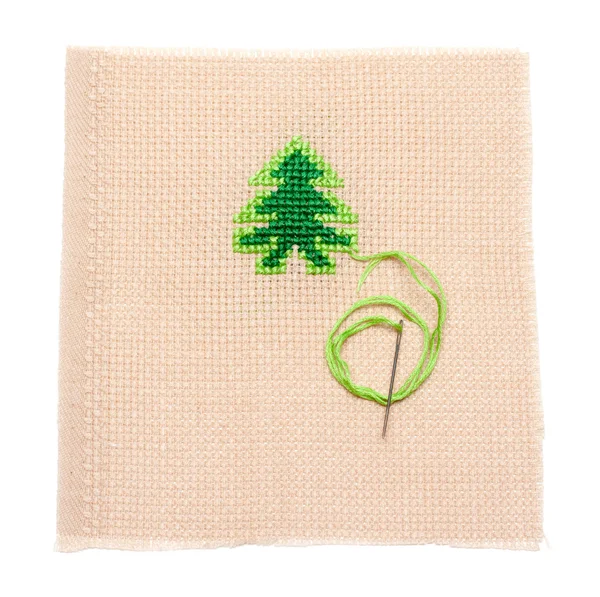 Green spruce on fabrics, needle — Stock Photo, Image