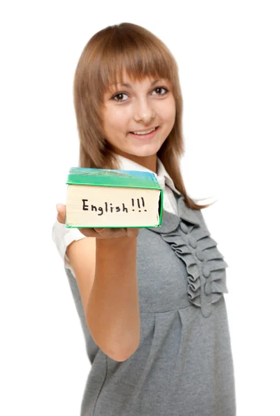 Chica joven con diccionario Inglés — Foto de Stock