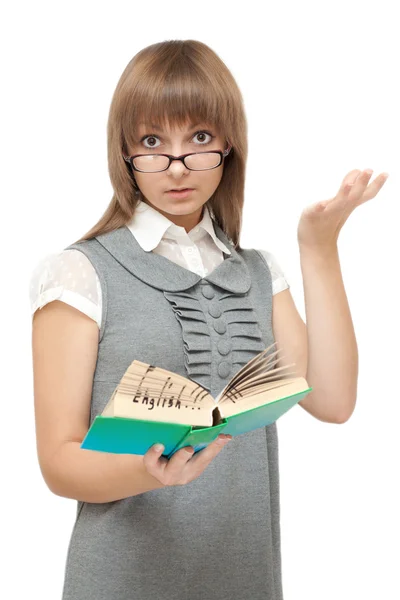Young girl reads english and is amazed — Stock Photo, Image
