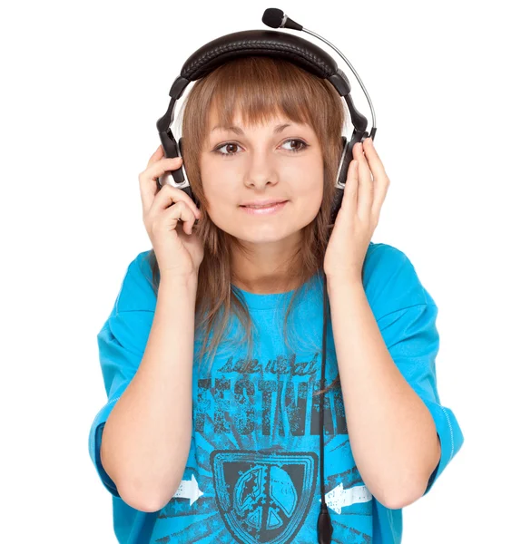 Girl in earphone smiles — Stock Photo, Image