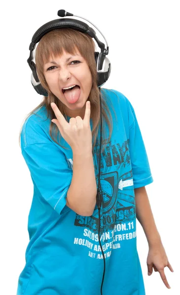 Meisje in oortelefoon toont taal — Stockfoto