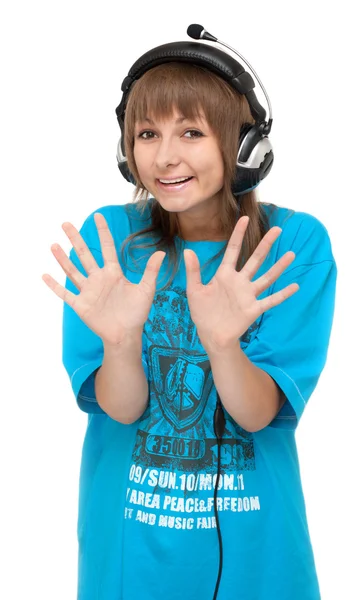 Chica en auriculares muestra la palma — Foto de Stock