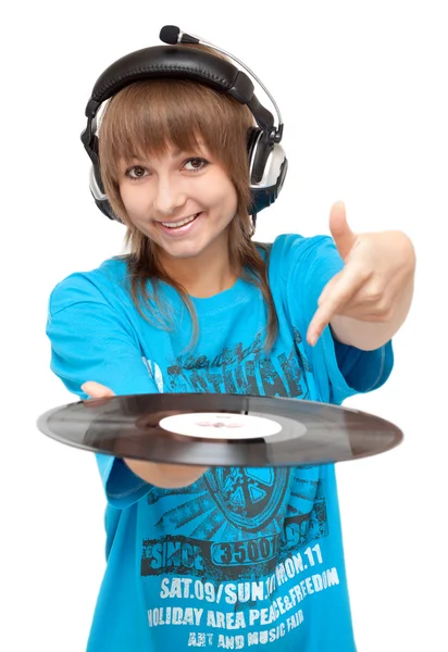 Girl in earphone with vinyl disk in hand — Stock Photo, Image