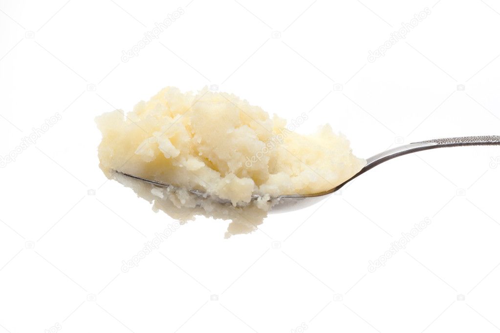 Spoon with mashed potatoes