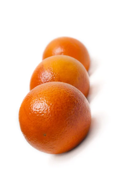 Tre apelsiner linje — Stockfoto