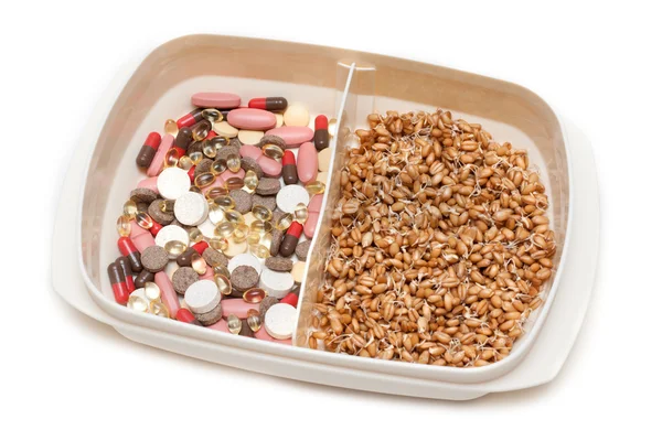 Pillola, compressa vs grano — Foto Stock