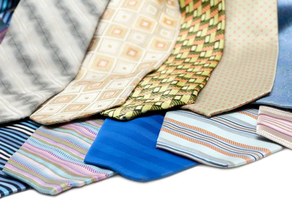 Male ties over white background