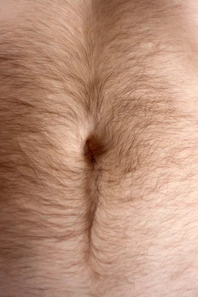 Manliga hårstrån mage, navel — Stockfoto