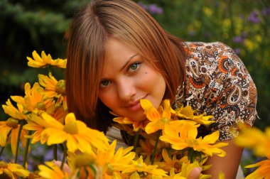 Young pretty woman and flowers