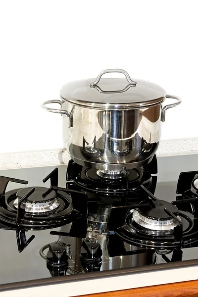 Pot at stove — Stock Photo, Image