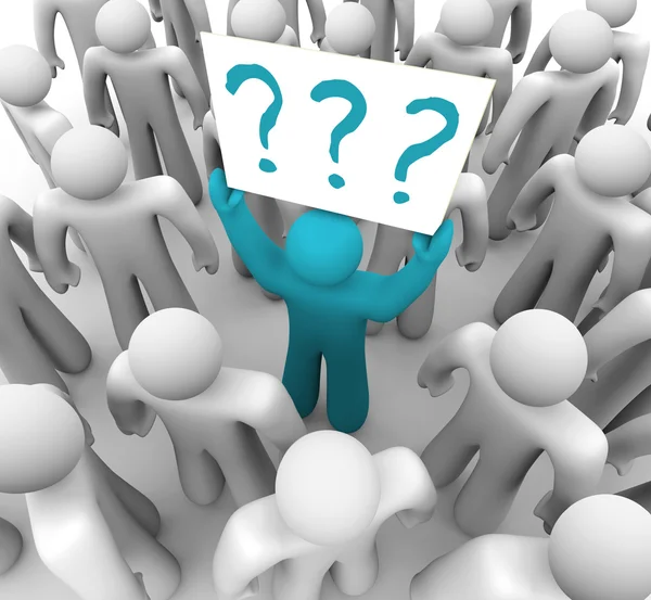 Person Holding Question Mark Sign in Crowd — Stock Photo, Image