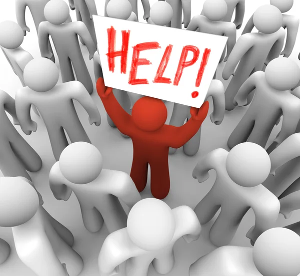 Person Holding Help Sign in Crowd — Stock Photo, Image