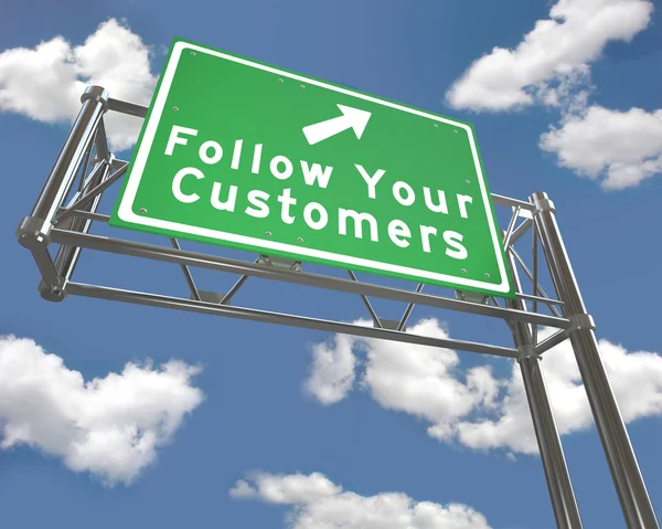 Freeway tecken - Följ dina kunder — Stockfoto