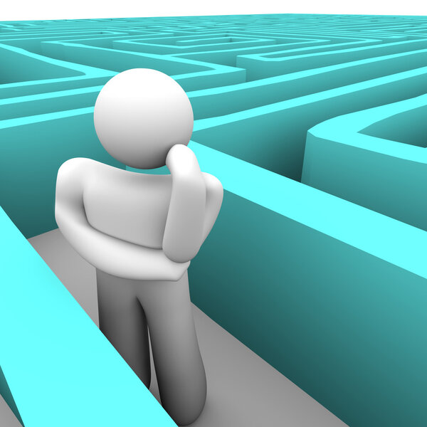 Person in Blue Labyrinth Thinking of Way Out