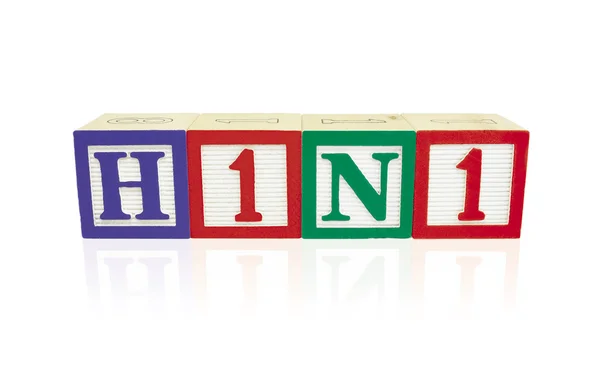 甲型 h1n1 流感字母表块与反思 — 图库照片