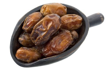 Scoop of dried medjool dates clipart