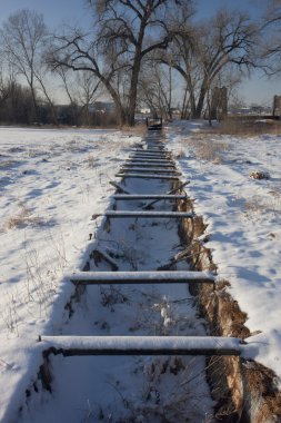 Old abandoned irrigation ditch flume clipart