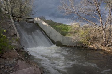 Irrigation water in Colorado farmland clipart