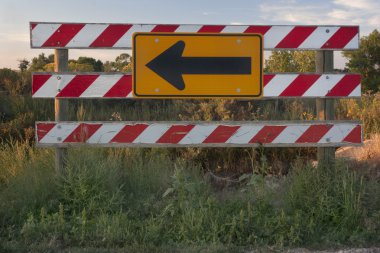 End of road barrier with arrow sign clipart