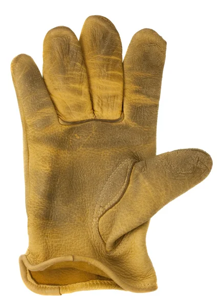 Зношена жовта шкіряна рукавичка — стокове фото