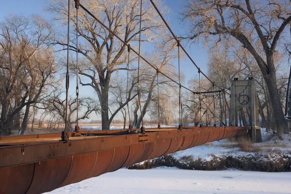 Old rusty aqueduct across a river — Stock Photo, Image
